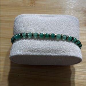 Green Beaded Stretch Bracelet with Gold Spacer Accents